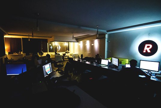 People working in Revolute office