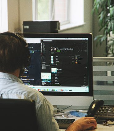 re Office working at computer